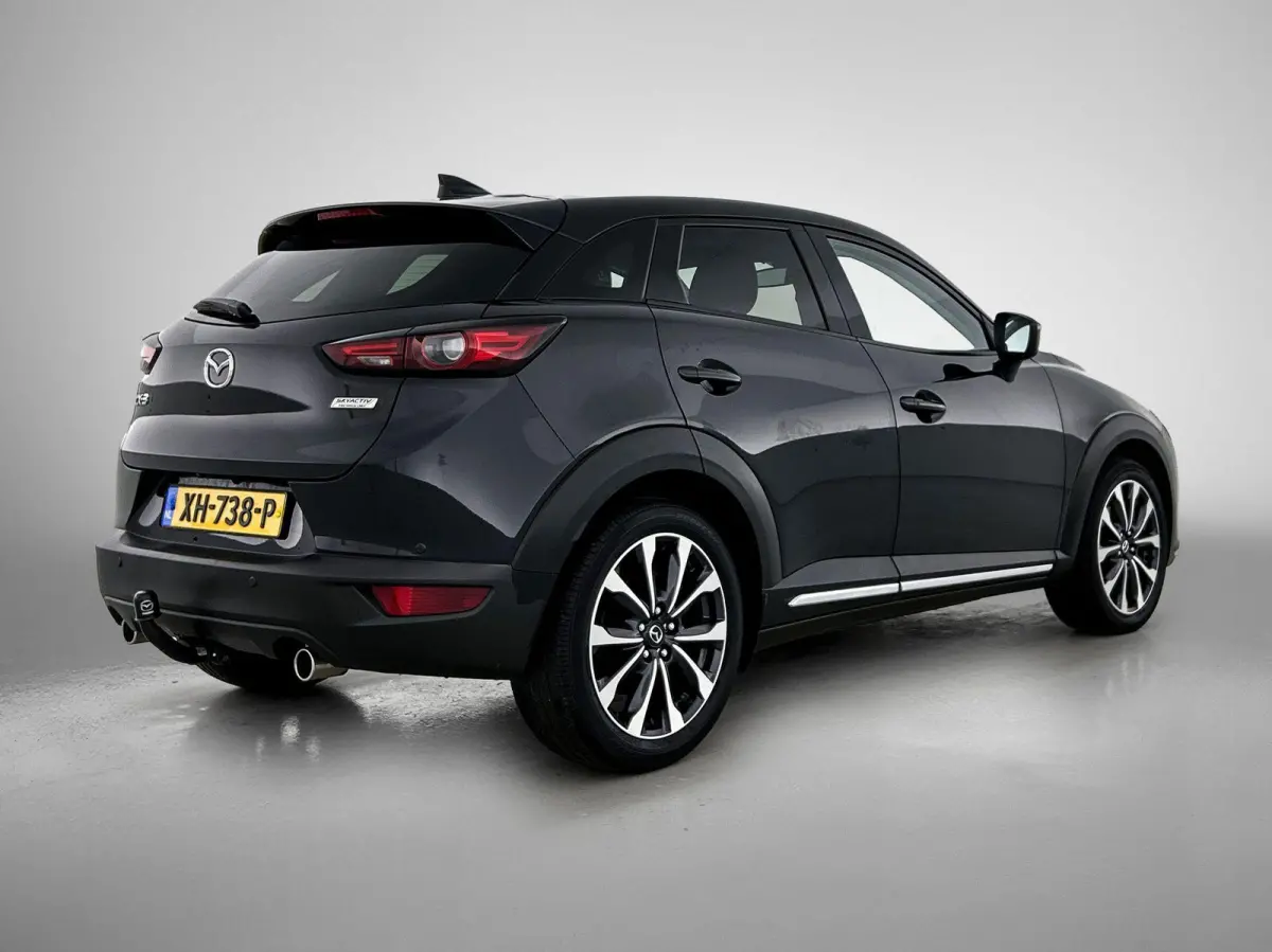 2.0 SkyActiv-G 120 GT-M | TREKHAAK | LEER | CAMERA | NAVIGATIE | HEAD-UP | STOEL-STUURWIELVERWARMING | BOSE AUDIO