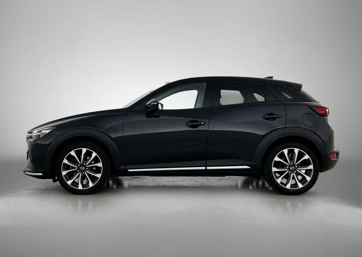 2.0 SkyActiv-G 120 GT-M | TREKHAAK | LEER | CAMERA | NAVIGATIE | HEAD-UP | STOEL-STUURWIELVERWARMING | BOSE AUDIO