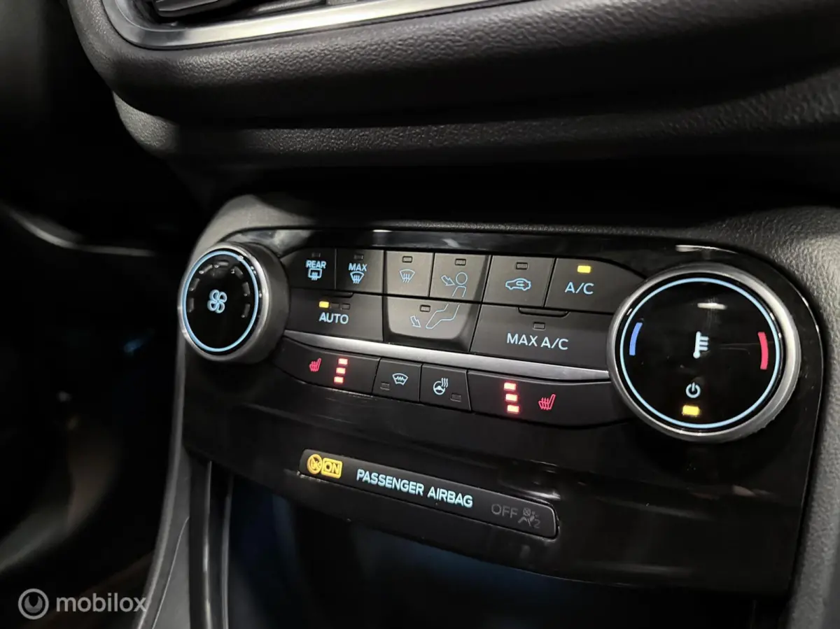1.0 EcoBoost ST-Line AUTOM. / 1e EIG. / NAP / STOELVERW. / TR.HAAK / NAVI / CLIMA / CRUISE