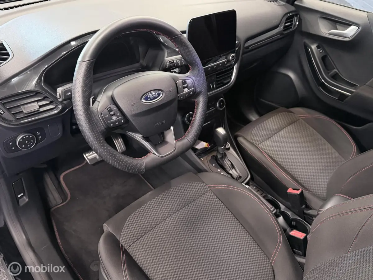 1.0 EcoBoost ST-Line AUTOM. / 1e EIG. / NAP / STOELVERW. / TR.HAAK / NAVI / CLIMA / CRUISE