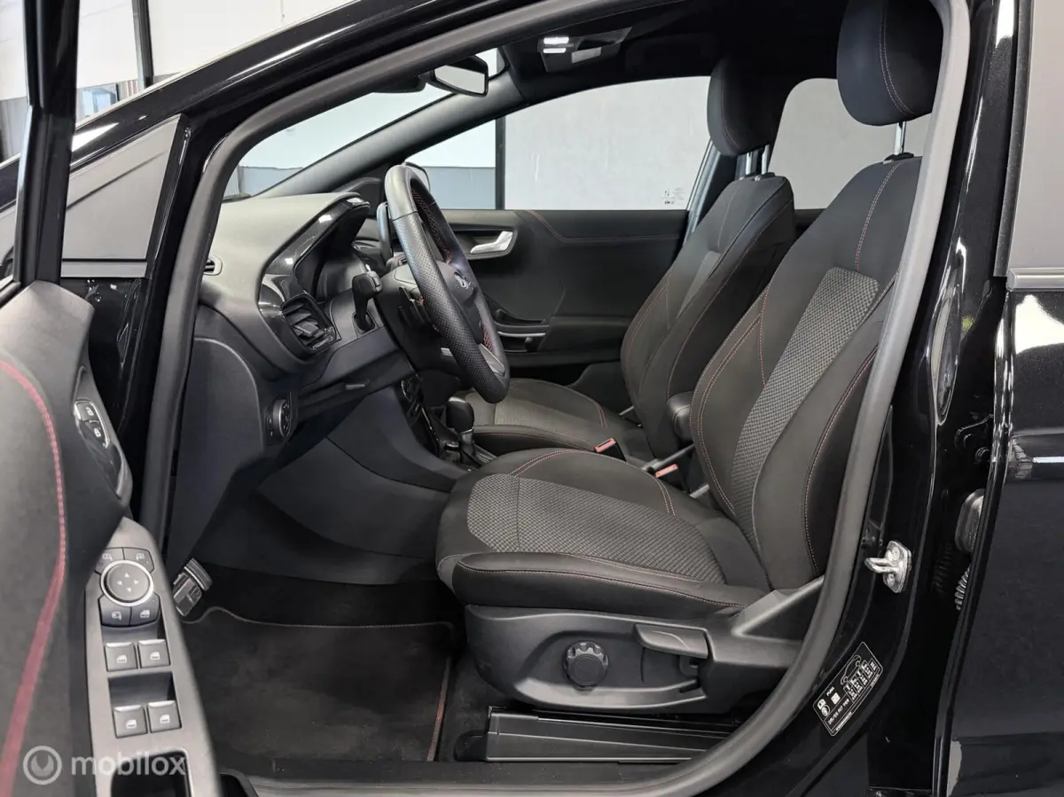 1.0 EcoBoost ST-Line AUTOM. / 1e EIG. / NAP / STOELVERW. / TR.HAAK / NAVI / CLIMA / CRUISE