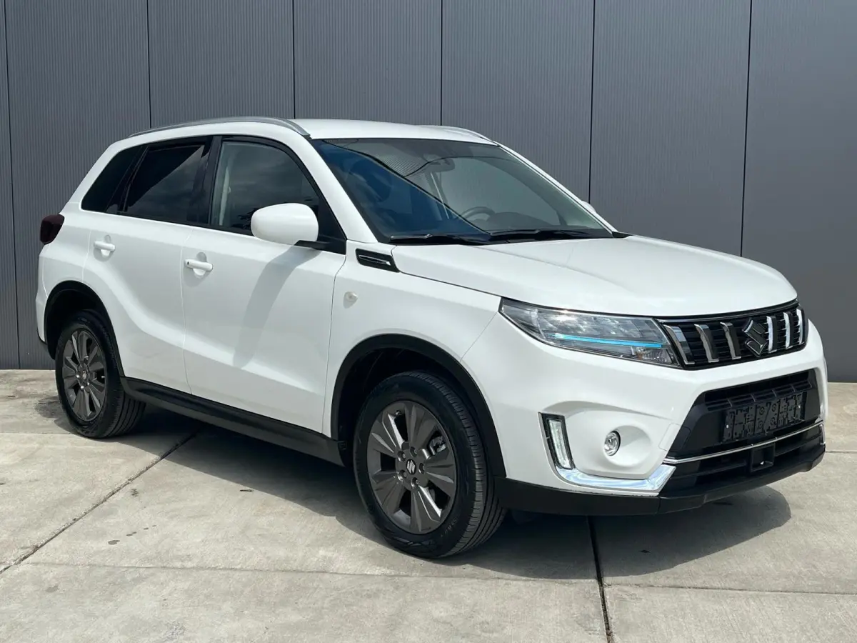 1.5 Hybrid Select Automaat | Adaptive Cruise | Camera | Climate Control | Keyless | Stoelverwarming |
