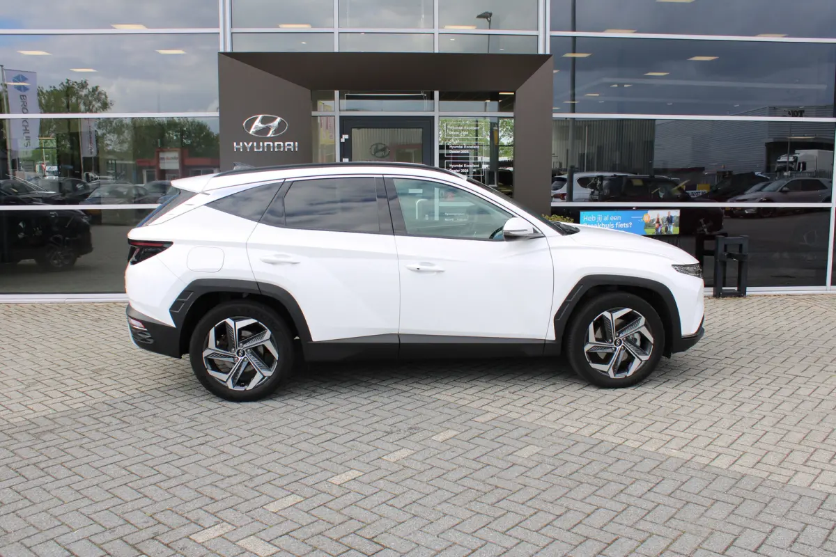 1.6 T-GDI PHEV Comfort Smart 4WD | 11 kW lader | Achteruitrijcamera | Airco (automatisch)