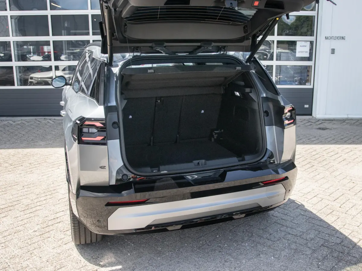 First Edition 74 kWh | Adapt. Cruise | Camera | Carplay | 20" | Elektr. A-Klep | Navi | Winter Pack | Schuif/Kanteldak | Premium Pack | Conv. Pack | Warmtepomp
