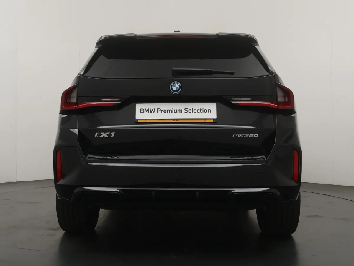 eDrive20 67 kWh M Sport Edition | SoH 100% | Comfort Access | Elektrisch bediende stoel | Massage | Panoramadak | Adaptive Cruise |