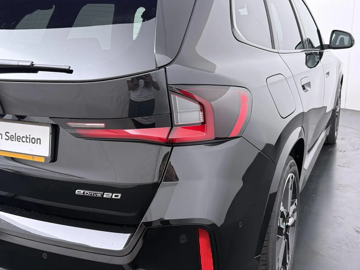 eDrive20 67 kWh M Sport Edition | SoH 100% | Comfort Access | Elektrisch bediende stoel | Massage | Panoramadak | Adaptive Cruise |
