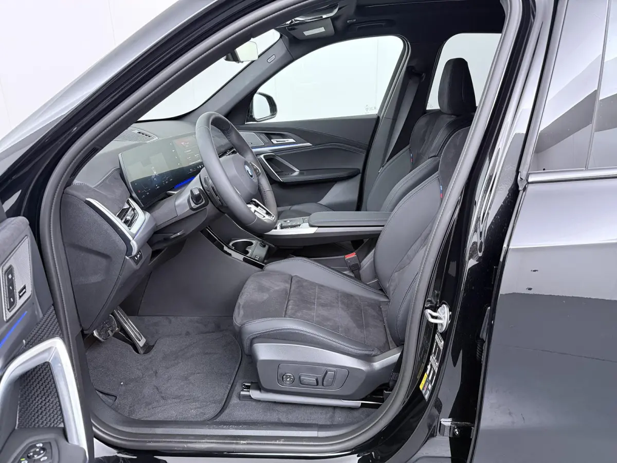 eDrive20 67 kWh M Sport Edition | SoH 100% | Comfort Access | Elektrisch bediende stoel | Massage | Panoramadak | Adaptive Cruise |
