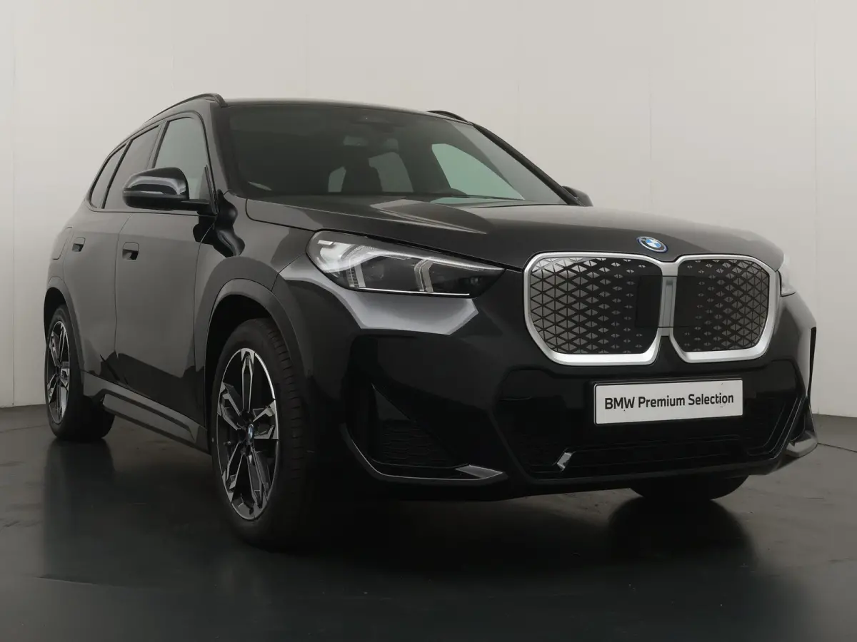 eDrive20 67 kWh M Sport Edition | SoH 100% | Comfort Access | Elektrisch bediende stoel | Massage | Panoramadak | Adaptive Cruise |