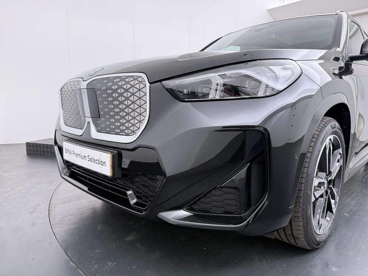 eDrive20 67 kWh M Sport Edition | SoH 100% | Comfort Access | Elektrisch bediende stoel | Massage | Panoramadak | Adaptive Cruise |