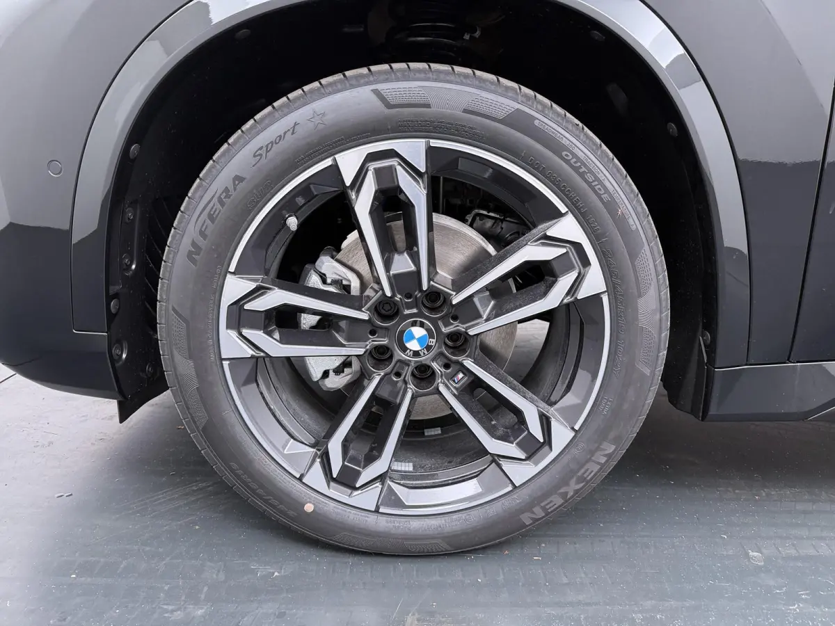 eDrive20 67 kWh M Sport Edition | SoH 100% | Comfort Access | Elektrisch bediende stoel | Massage | Panoramadak | Adaptive Cruise |