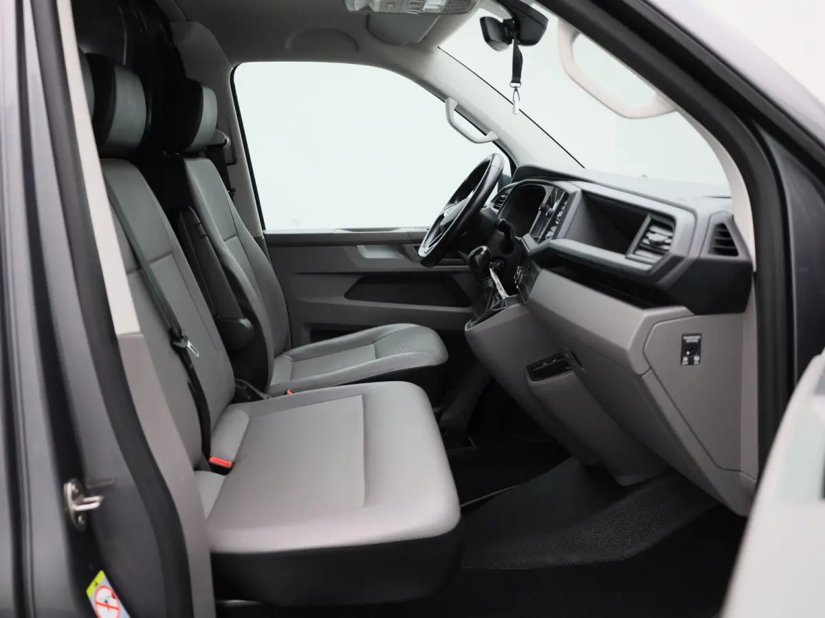 2.0 TDI L2H1 204PK | Automaat | Trekhaak | Multifunctioneel Stuurwiel | Dubbele Schuifdeur | Navigatie | Parkeerhulp Voor + Achter | Cruise Control | LED-Koplampen | LED-Achterlichten | Acht