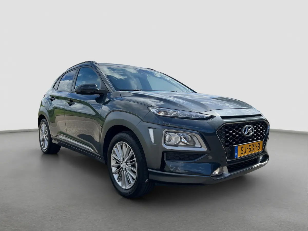1.0 T-GDI 120pk Fashion | Camera | Trekhaak | Climate controle | Carplay | 17'' velgen | Keyless entry | Parkeersensoren | Elektrische spiegels