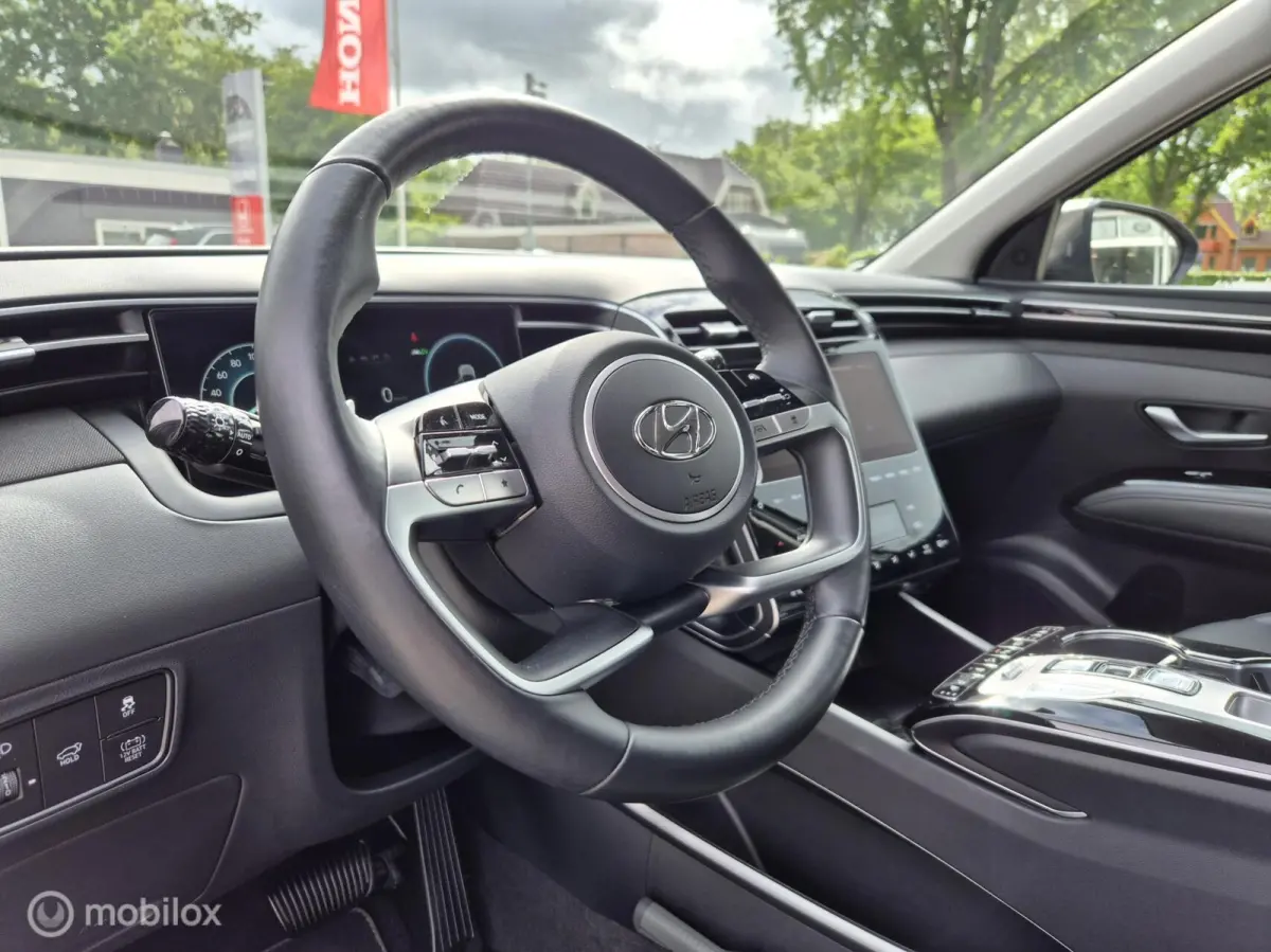 1.6 T-GDI HEV Premium, Leer, 360 Camera, NAP!