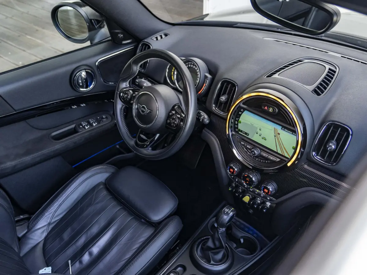 Cooper SE ALL4 Chili SoH 96% | Achteruitrijcamera | Elektrische achterklep | Glazen panoramadak | Active Cruise Control | Stoelverwarming |