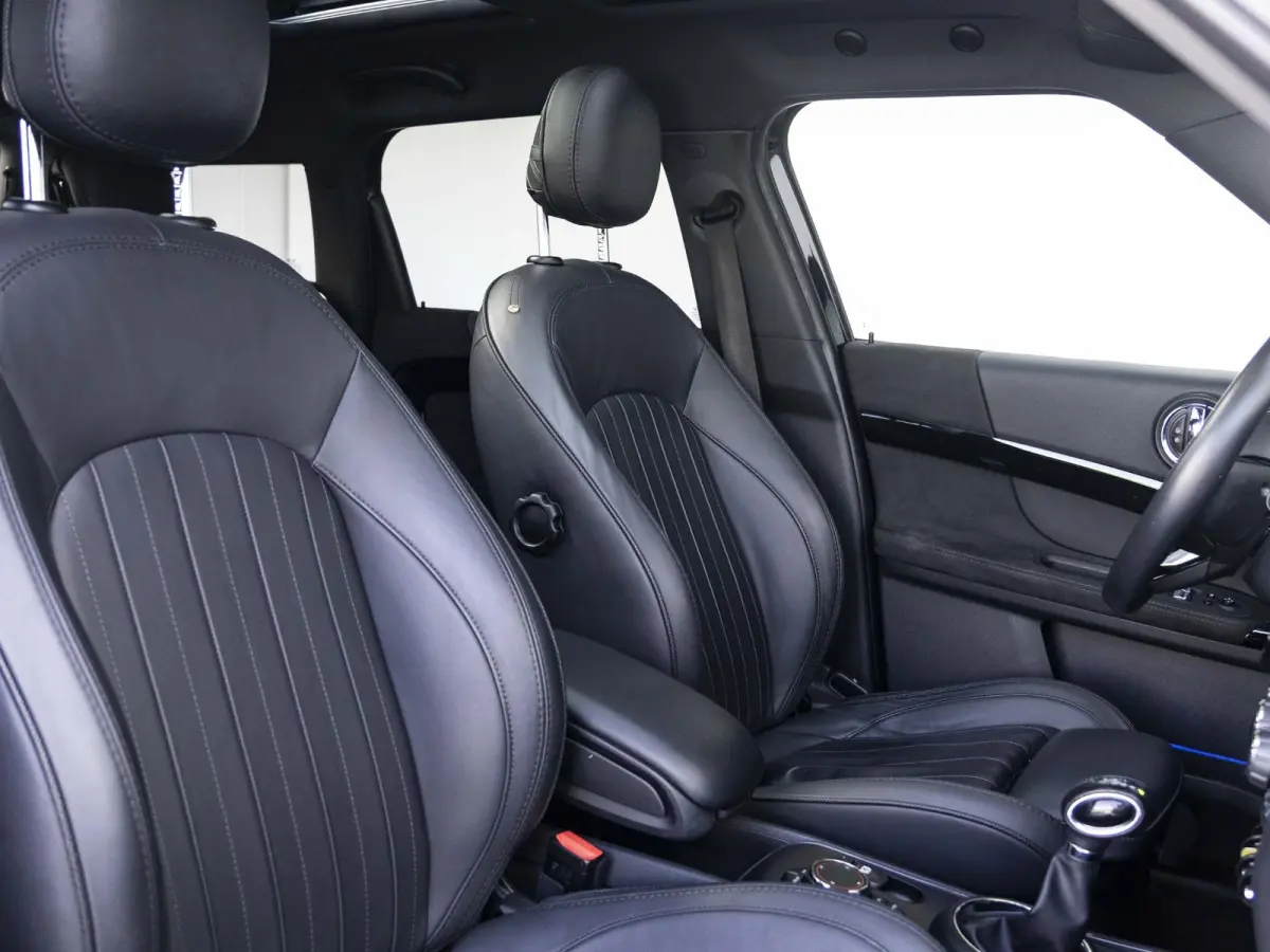 Cooper SE ALL4 Chili SoH 96% | Achteruitrijcamera | Elektrische achterklep | Glazen panoramadak | Active Cruise Control | Stoelverwarming |