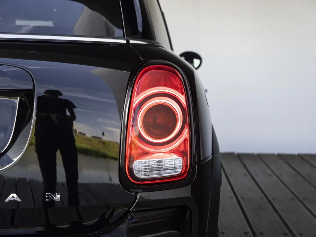 Cooper SE ALL4 Chili SoH 96% | Achteruitrijcamera | Elektrische achterklep | Glazen panoramadak | Active Cruise Control | Stoelverwarming |