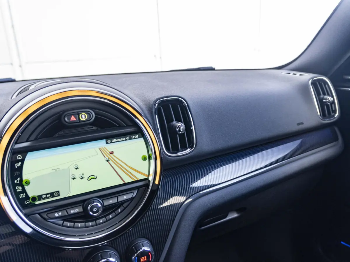 Cooper SE ALL4 Chili SoH 96% | Achteruitrijcamera | Elektrische achterklep | Glazen panoramadak | Active Cruise Control | Stoelverwarming |