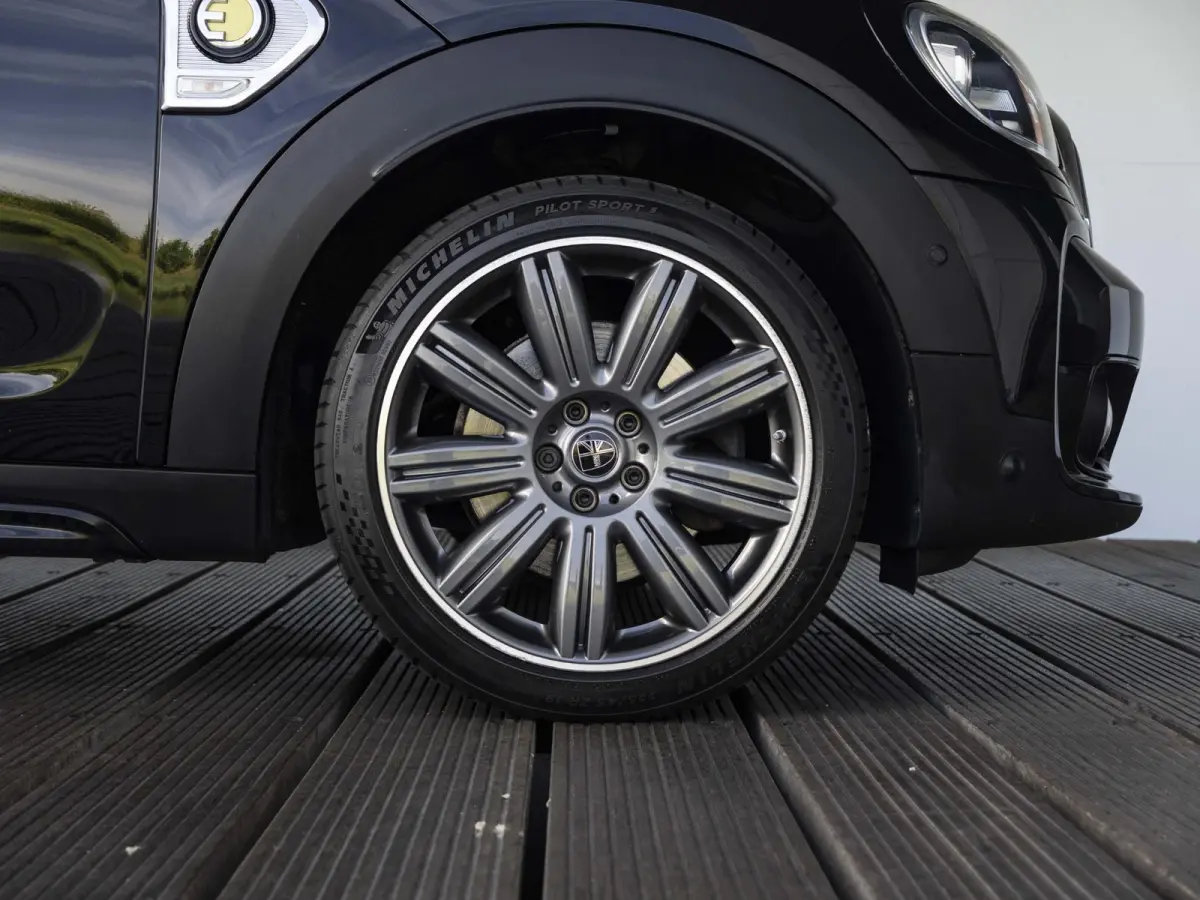 Cooper SE ALL4 Chili SoH 96% | Achteruitrijcamera | Elektrische achterklep | Glazen panoramadak | Active Cruise Control | Stoelverwarming |