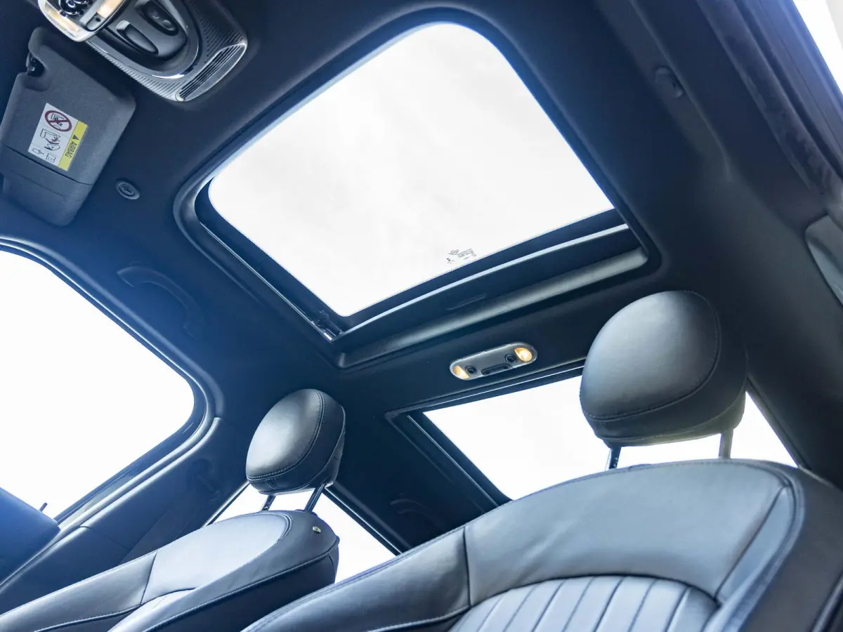 Cooper SE ALL4 Chili SoH 96% | Achteruitrijcamera | Elektrische achterklep | Glazen panoramadak | Active Cruise Control | Stoelverwarming |