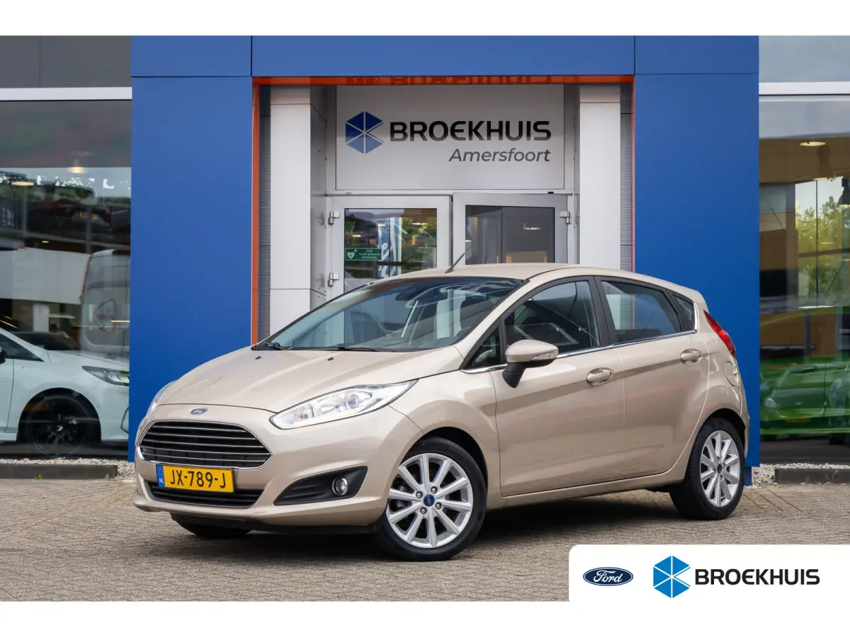 1.0 EcoBoost Titanium | Cruise control | Navigatie | Parkeersensoren | Verwarmde voorruit | Clima | Airco (automatisch) | Cruise control | Lichtmetalen velgen 16"