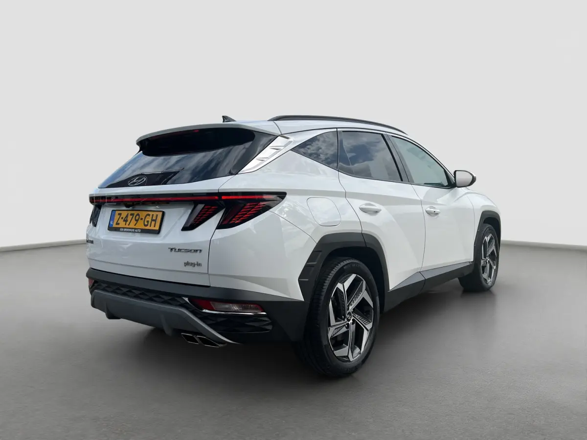 1.6 T-GDI 265pk PHEV Comfort Smart 4WD | Climate | Camera | Carplay | Keyless | Navigatie | Full - Led | Elek. Klep | Winterpakket | 19" Lichtmetaal | Krell Audio | Digitale Cockpit | Parkee