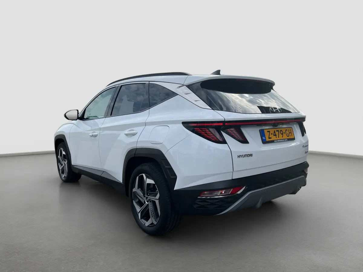 1.6 T-GDI 265pk PHEV Comfort Smart 4WD | Climate | Camera | Carplay | Keyless | Navigatie | Full - Led | Elek. Klep | Winterpakket | 19" Lichtmetaal | Krell Audio | Digitale Cockpit | Parkee