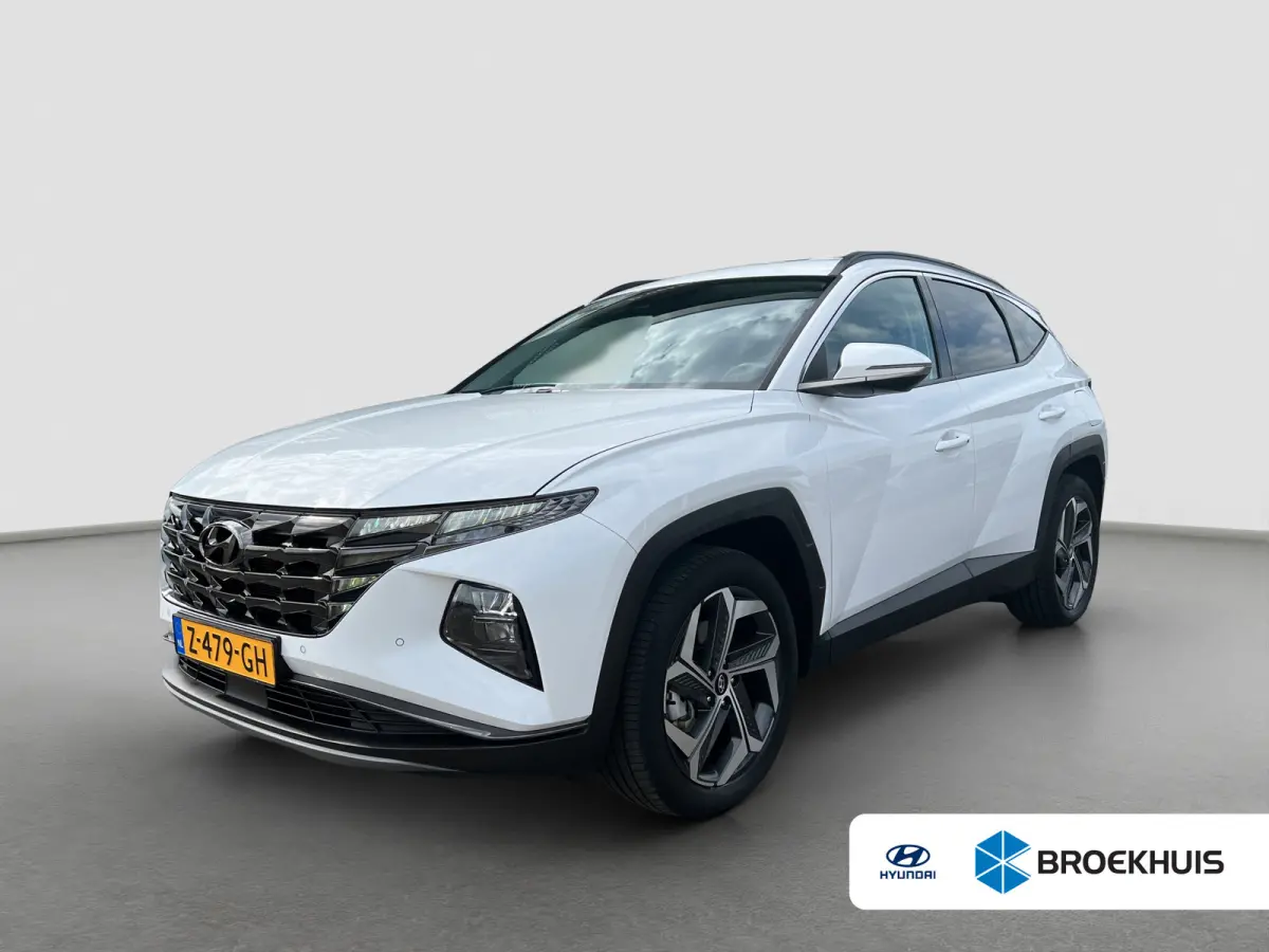 1.6 T-GDI 265pk PHEV Comfort Smart 4WD | Climate | Camera | Carplay | Keyless | Navigatie | Full - Led | Elek. Klep | Winterpakket | 19" Lichtmetaal | Krell Audio | Digitale Cockpit | Parkee