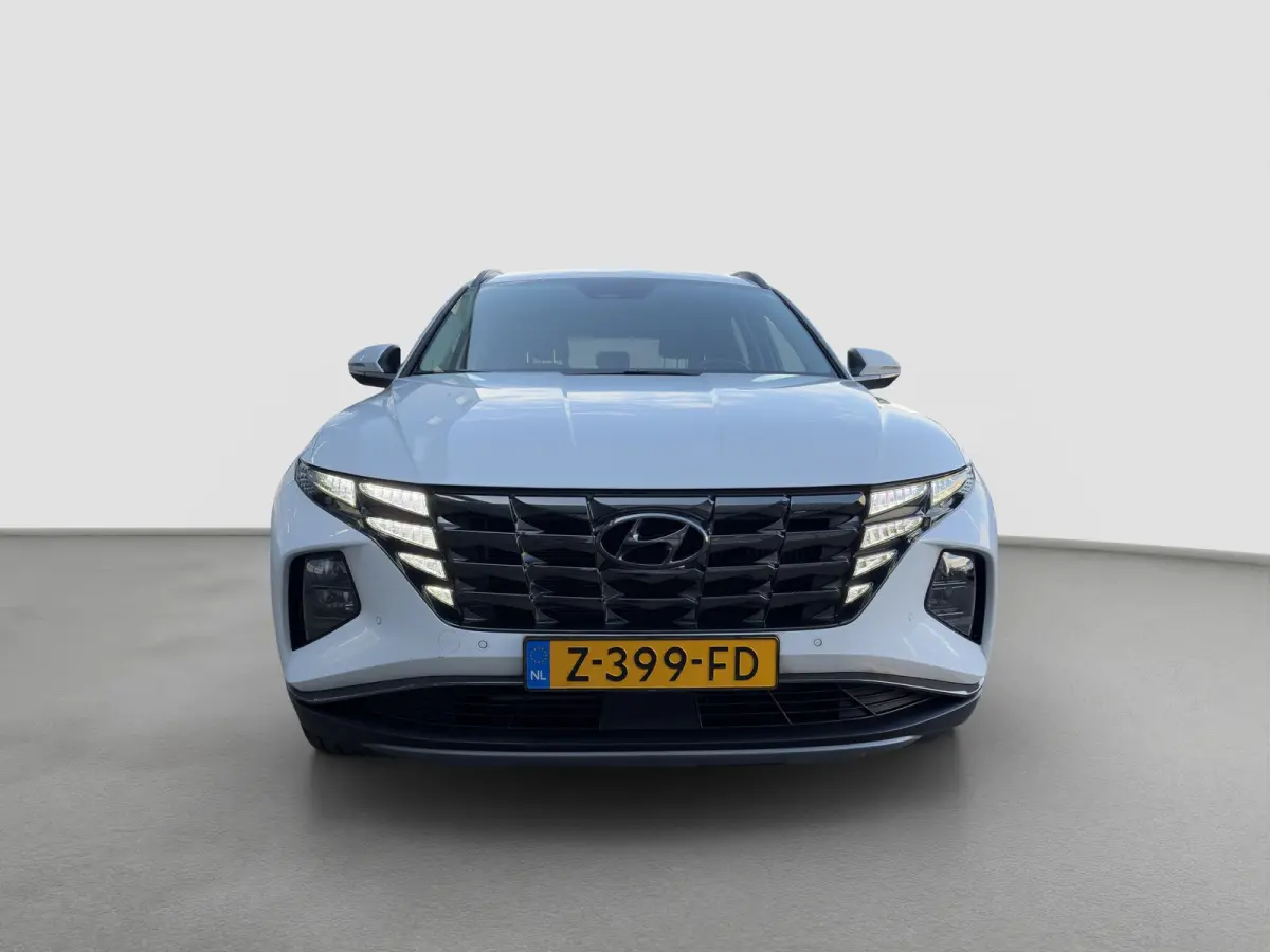 1.6 T-GDI 265pk PHEV Comfort Smart 4WD | Climate | Camera | Carplay | Keyless | Navigatie | Full - Led | Elek. Klep | Winterpakket | 19" Lichtmetaal | Krell Audio | Digitale Cockpit | Parkee