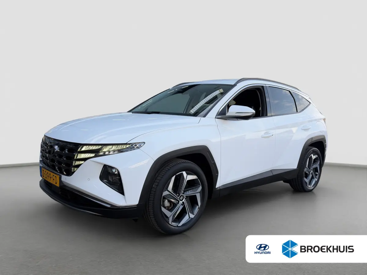 1.6 T-GDI 265pk PHEV Comfort Smart 4WD | Climate | Camera | Carplay | Keyless | Navigatie | Full - Led | Elek. Klep | Winterpakket | 19" Lichtmetaal | Krell Audio | Digitale Cockpit | Parkee