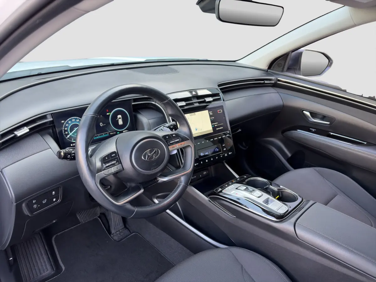 1.6 T-GDI 265pk PHEV Comfort Smart 4WD | Climate | Camera | Carplay | Keyless | Navigatie | Full - Led | Elek. Klep | Winterpakket | 19" Lichtmetaal | Krell Audio | Digitale Cockpit | Parkee