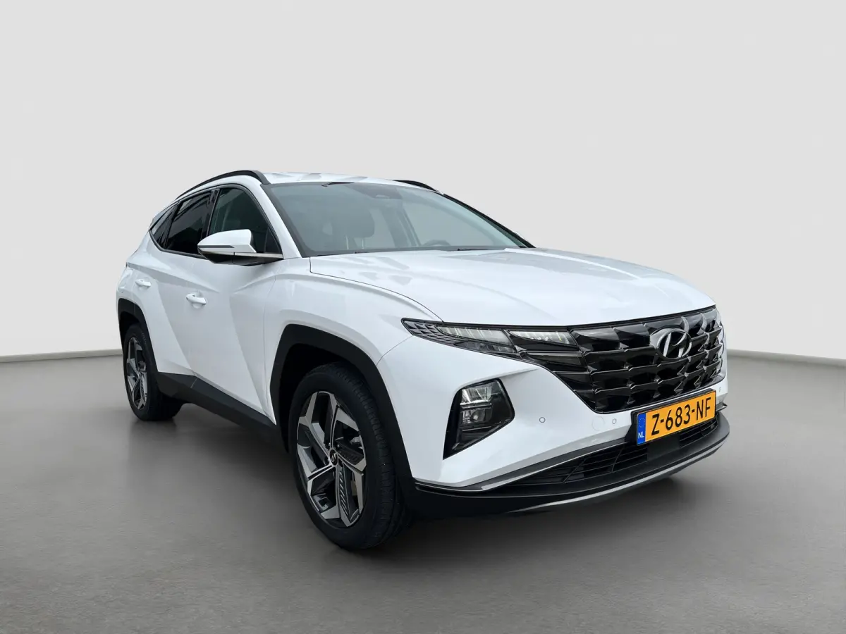 1.6 T-GDI PHEV Comfort Smart 4WD | Climate | Camera | Carplay | Keyless | Navigatie | Full - Led | Elek. Klep | Winterpakket | 19" Lichtmetaal | Digitale Cockpit | Parkeer Assistent | Adapt.