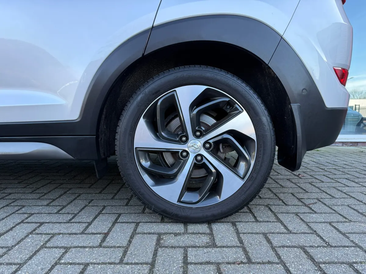1.6 T-GDi Premium 4WD - Automaat - Pano/schuifdak - Leder - Navi - Winterpakket