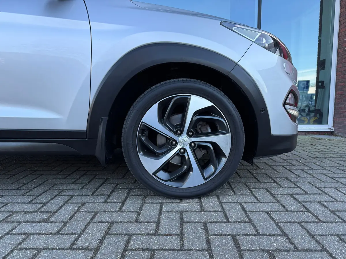 1.6 T-GDi Premium 4WD - Automaat - Pano/schuifdak - Leder - Navi - Winterpakket