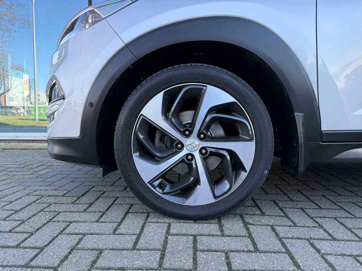 1.6 T-GDi Premium 4WD - Automaat - Pano/schuifdak - Leder - Navi - Winterpakket