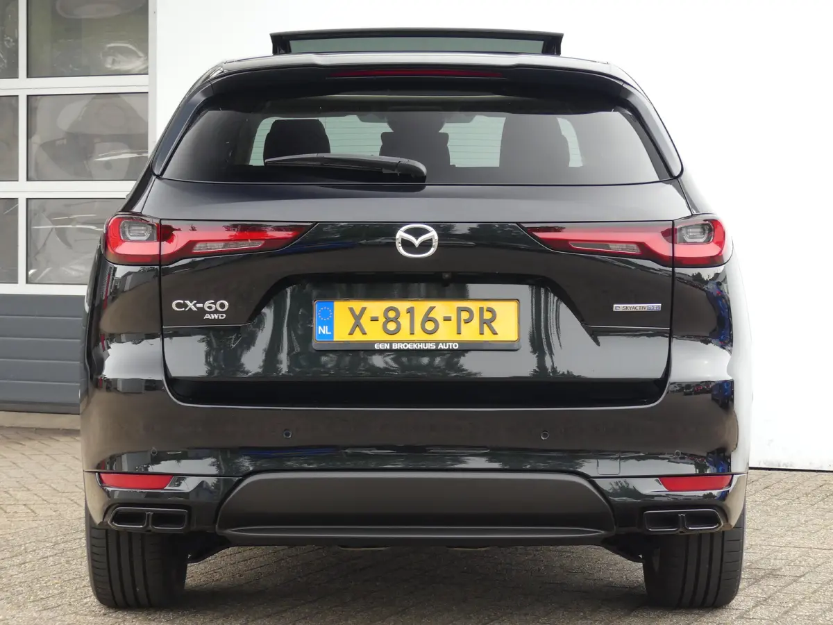 2.5 e-SkyActiv PHEV Homura | PANORAMADAK | ADAPTIVE CRUISE | CAMERA V+A | 360 CAMERA | STUUR+STOELVERWARMING | STOELVENTILATIE | PARKEERSENSOREN V+A | ELEKTRISCHE ACHTERKLEP | HEAD-UP | NAVI