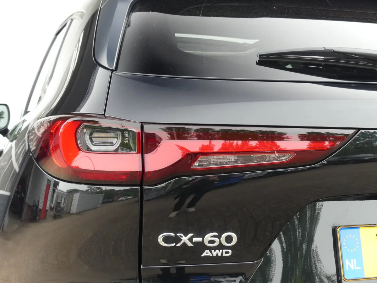 2.5 e-SkyActiv PHEV Homura | PANORAMADAK | ADAPTIVE CRUISE | CAMERA V+A | 360 CAMERA | STUUR+STOELVERWARMING | STOELVENTILATIE | PARKEERSENSOREN V+A | ELEKTRISCHE ACHTERKLEP | HEAD-UP | NAVI