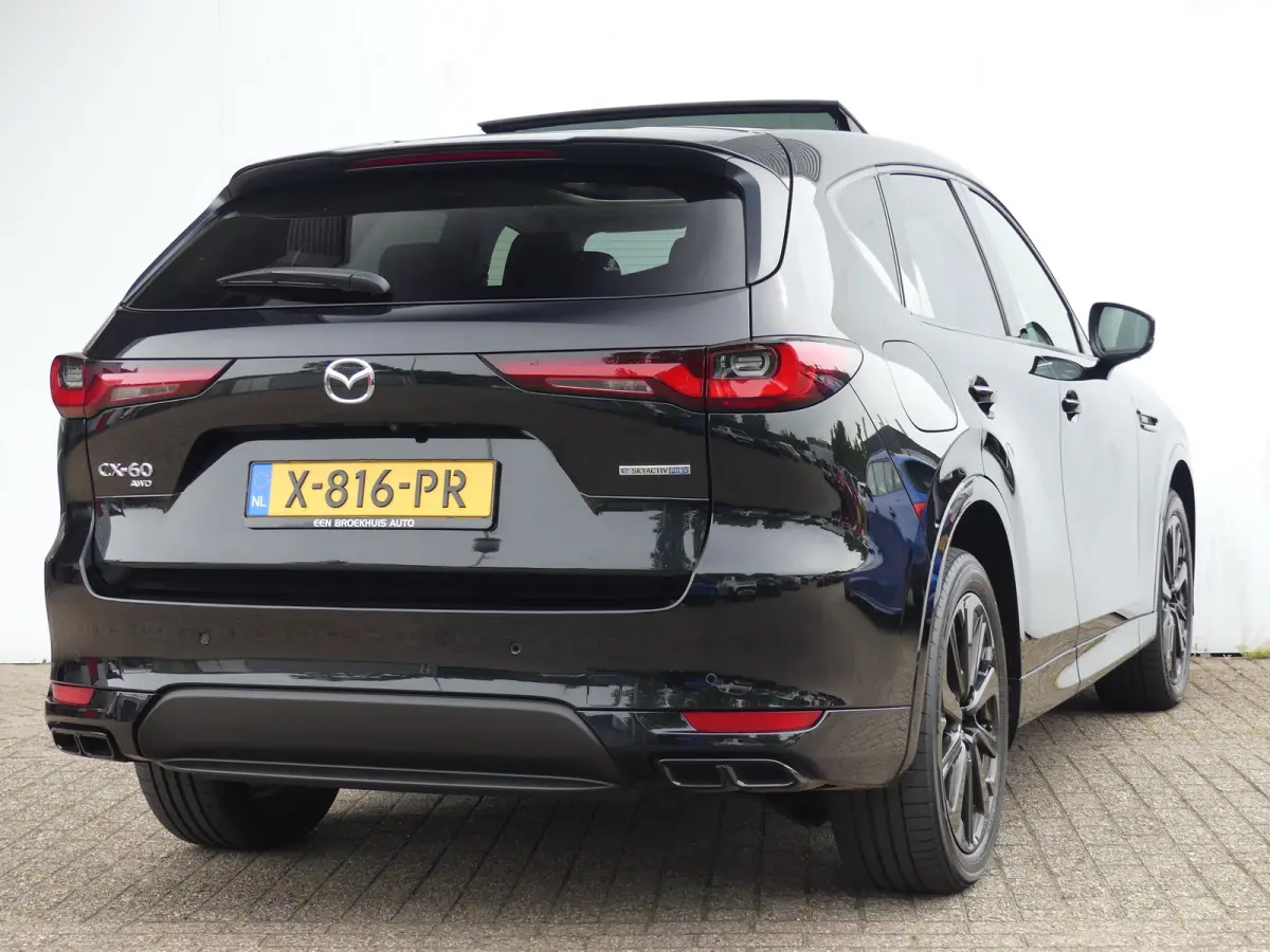 2.5 e-SkyActiv PHEV Homura | PANORAMADAK | ADAPTIVE CRUISE | CAMERA V+A | 360 CAMERA | STUUR+STOELVERWARMING | STOELVENTILATIE | PARKEERSENSOREN V+A | ELEKTRISCHE ACHTERKLEP | HEAD-UP | NAVI