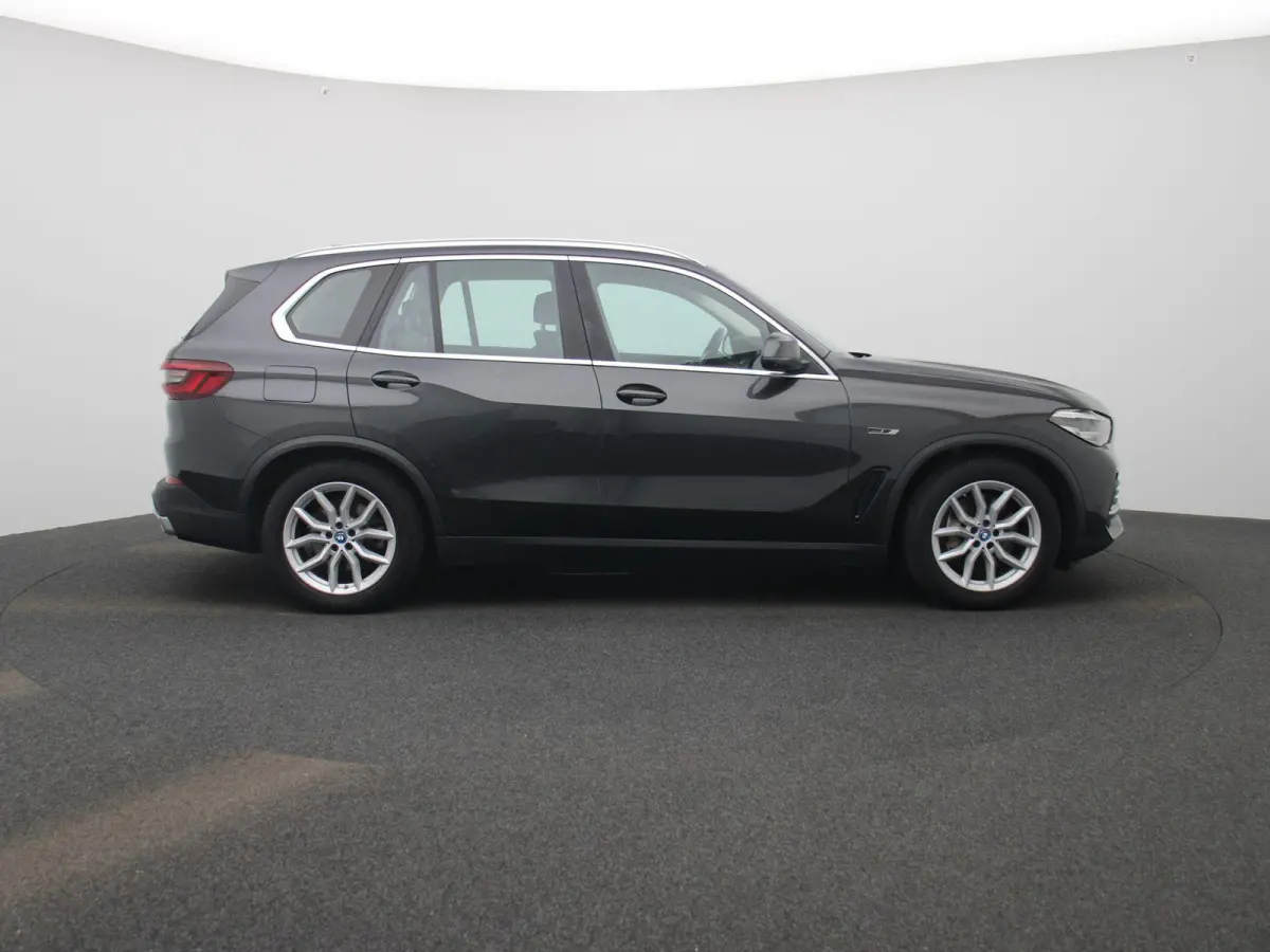 xDrive45e High Executive | PANO-SCHUIFDAK | HEAD-UP | HARMAN-KARDON | LEER | 360 CAMERA | STOELVERWARMING