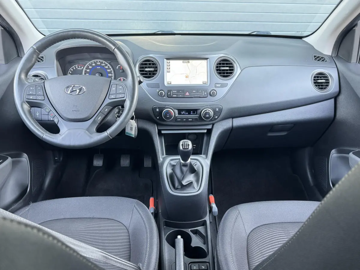 1.0I PREMIUM I APPLE CARPLAY I CLIMATE CONTROL I CRUISE CONTROL I NAVIGATIE