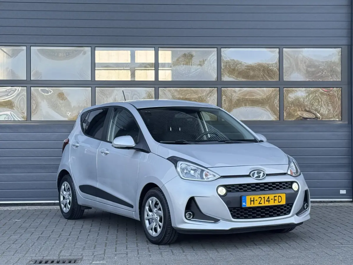 1.0I PREMIUM I APPLE CARPLAY I CLIMATE CONTROL I CRUISE CONTROL I NAVIGATIE