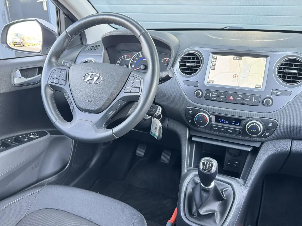 1.0I PREMIUM I APPLE CARPLAY I CLIMATE CONTROL I CRUISE CONTROL I NAVIGATIE