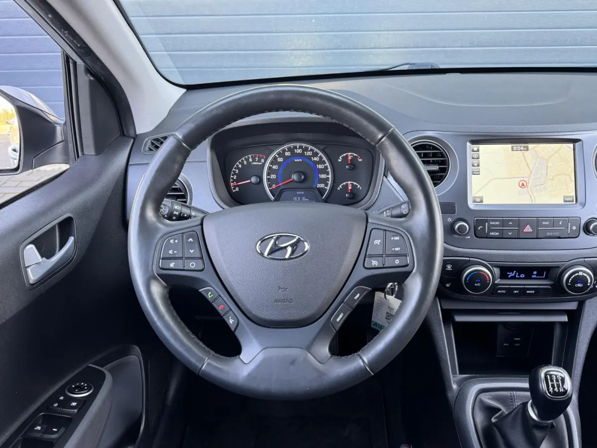 1.0I PREMIUM I APPLE CARPLAY I CLIMATE CONTROL I CRUISE CONTROL I NAVIGATIE