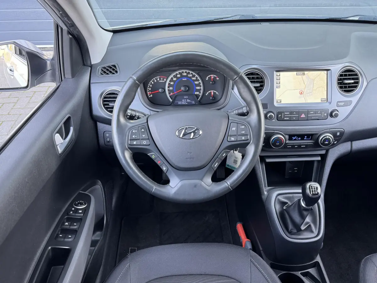 1.0I PREMIUM I APPLE CARPLAY I CLIMATE CONTROL I CRUISE CONTROL I NAVIGATIE