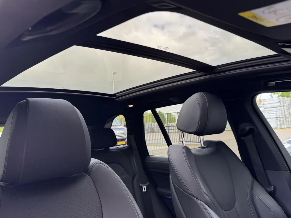 XDRIVE40I HIGH EXECUTIVE I M-SPORT I SCHUIF/KANTELDAK I STANDKACHEL I LUCHTVERING I 360° CAMERA