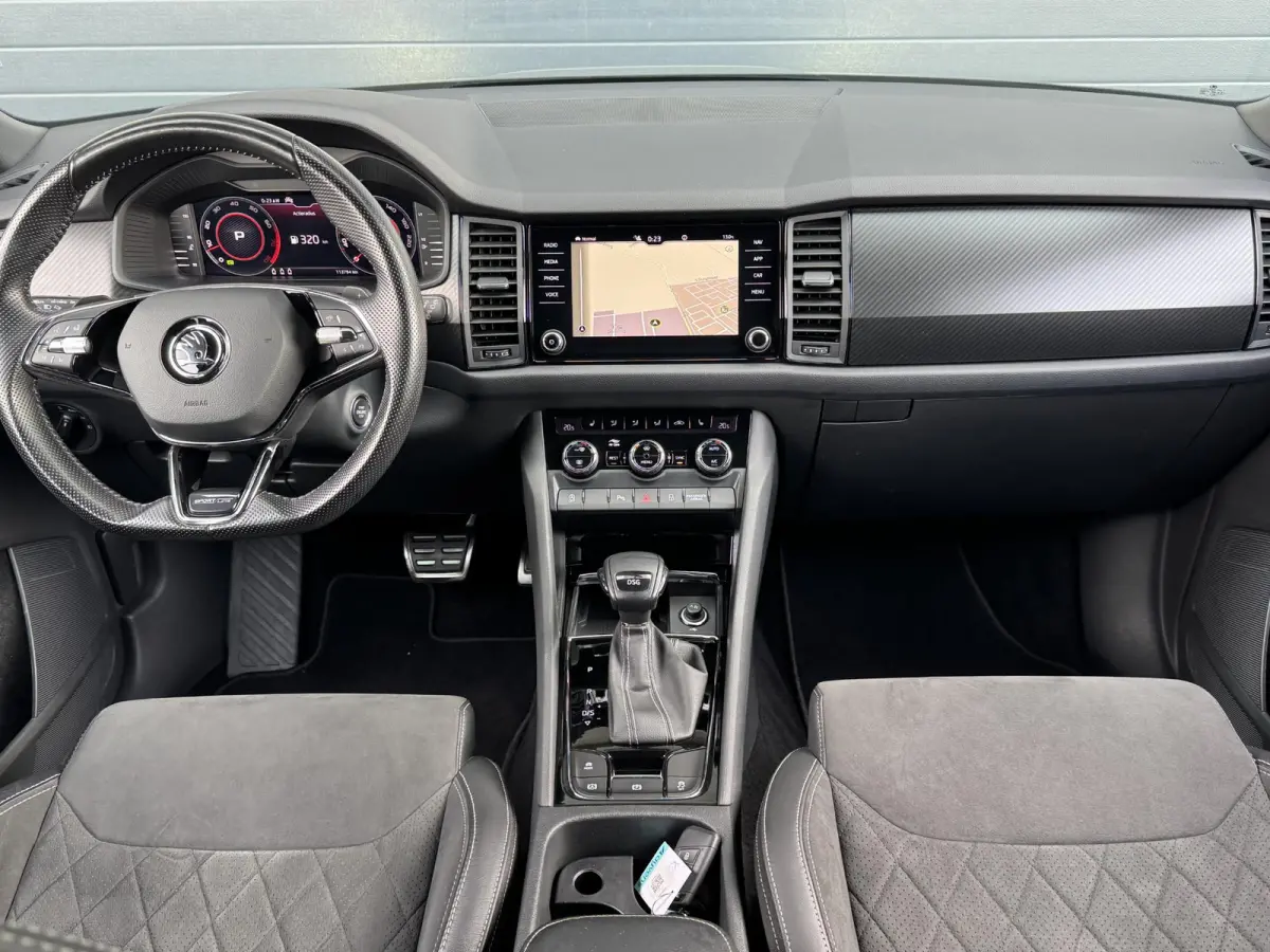 1.5 TSI SPORTLINE BUSINESS I AUTOMAAT I TREKHAAK (1800KG) I P-CAMERA I STOELVERWARMING