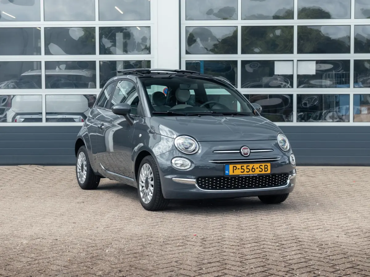 Hybrid Dolcevita | Airco | Cruise | 15" | Schuif/Kanteldak | PDC | Apple Carplay