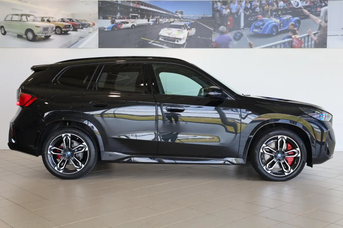 eDrive20 | M Sportpakket Pro | Driving Assistant Plus | SOH 100% | Head-Up Display | Stoelverwarming