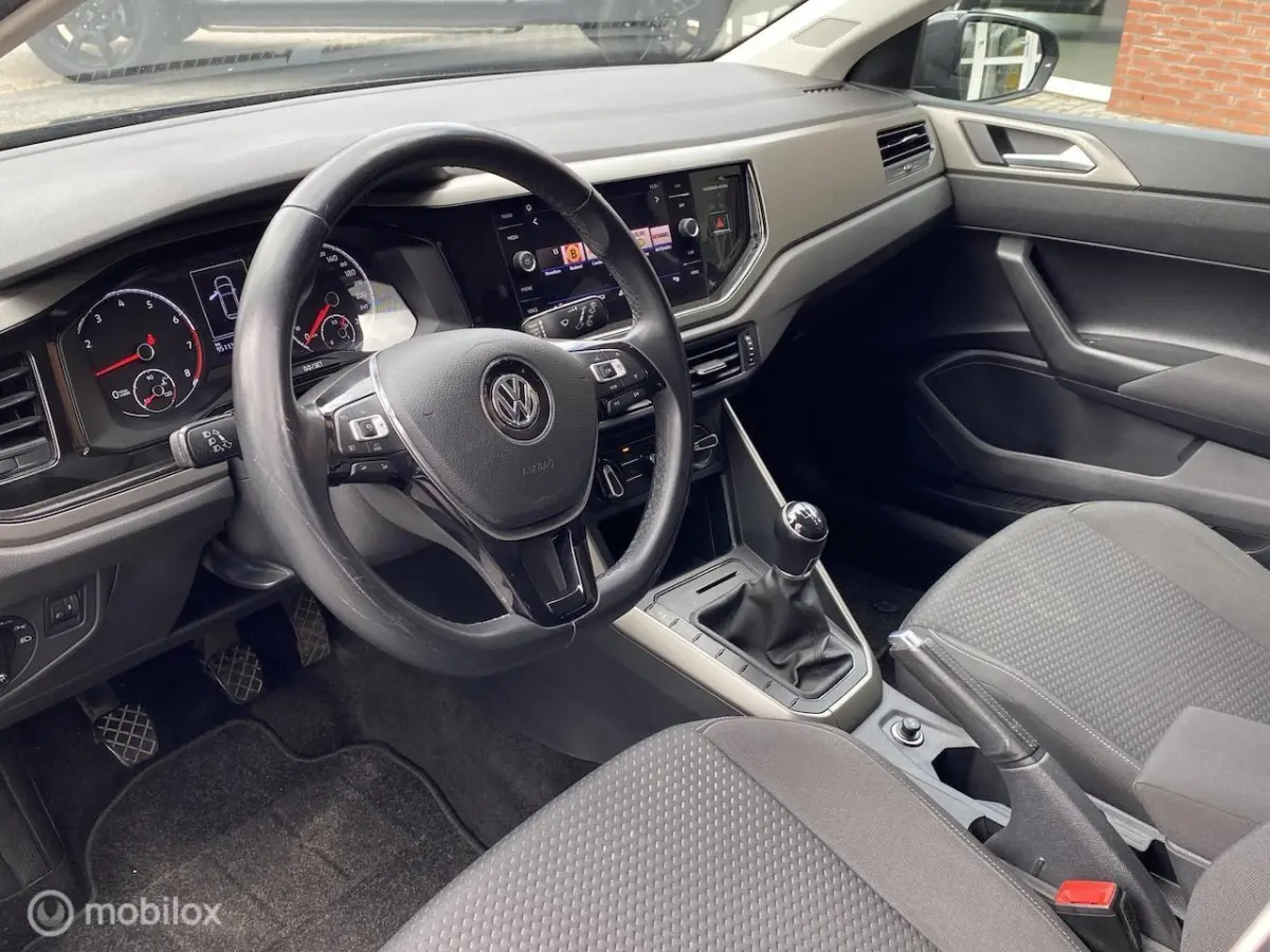 1.0 TSI Comfortline Als nieuw | Airco | Adapt. Cruise | Navigatie | Ndl auto | Apple Carpl