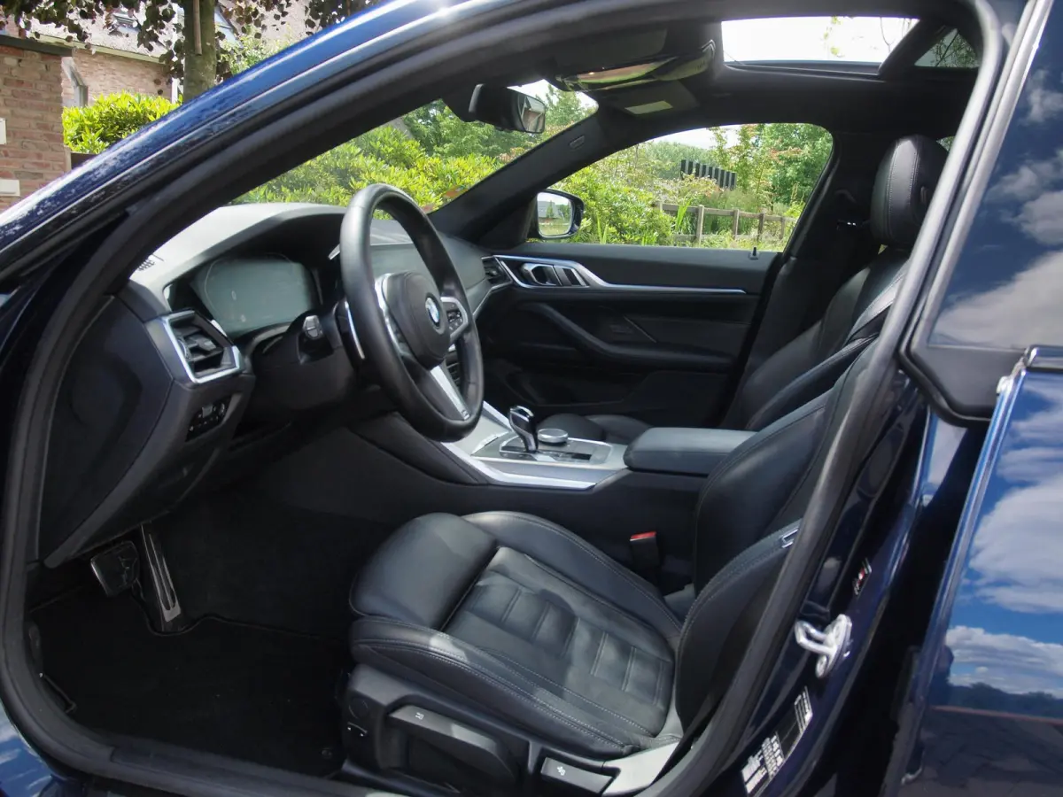 420i Business Edition Plus | M-Pakket | Panoramadak | Camera | Sfeerverlichting | Leer |