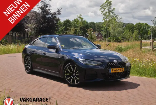 420i Business Edition Plus | M-Pakket | Panoramadak | Camera | Sfeerverlichting | Leer |